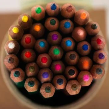 Multicolored pensils in the box Stock Photos
