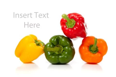 Multicolored peppers on a white background Stock Photos