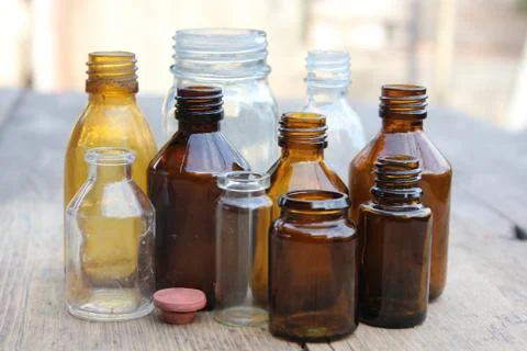 Multicolored pharmacy bottles Stock Photos