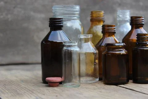 Multicolored pharmacy bottles Stock Photos