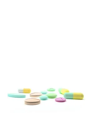 Multicolored pills and tablets isolated on white. Stock Illustration