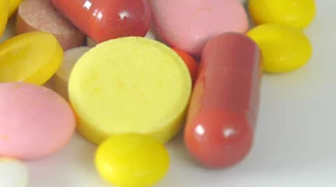 Multicolored pills rotate Stockbeeldmateriaal 21736179
