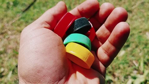 Multicolored Plastic Bottle Caps Recycling And Sustainability Concept Stock Footage 333542339
