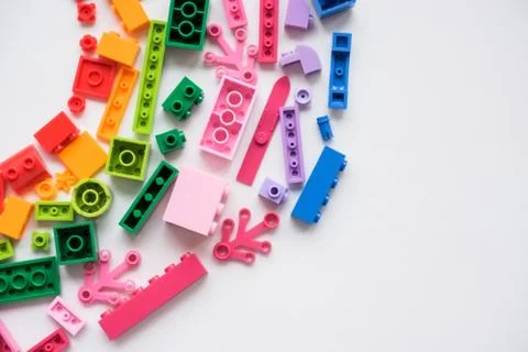 Multicolored plastic building blocks of the designer. plastic colored details Stock Photos