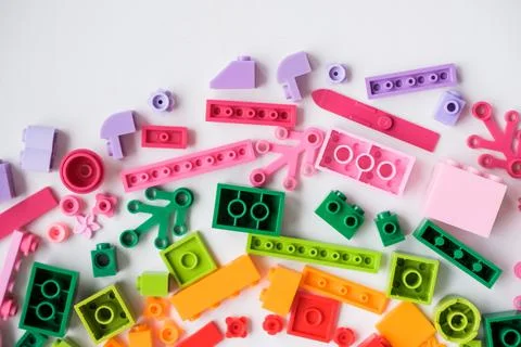 Multicolored plastic building blocks of the designer. Educational developing Stock Photos