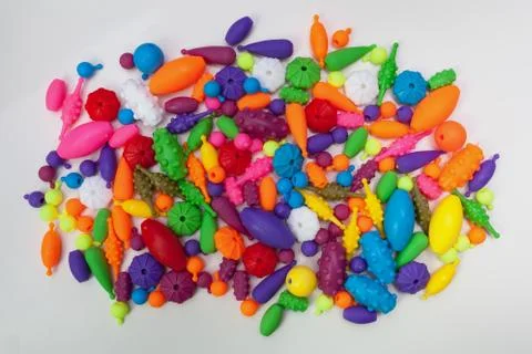 Multicolored plastic children's design figures Stock Photos