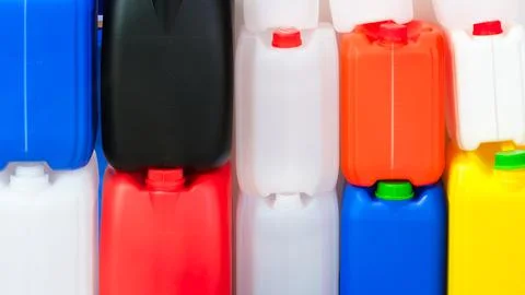Multicolored plastic jerry can containers Foto stock
