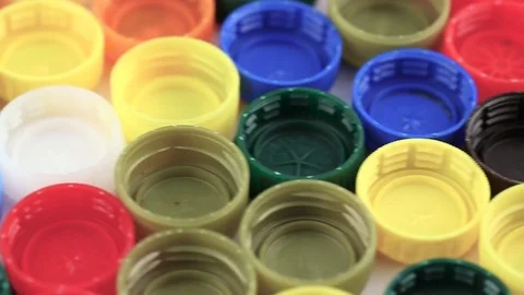Multicolored plastic lid caps Stock Footage 82793253