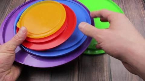 The Multicolored plastic lids. Plastic lids for containers. Stock Footage 171927099
