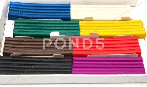 Multicolored plasticine on a white background Stock Photos