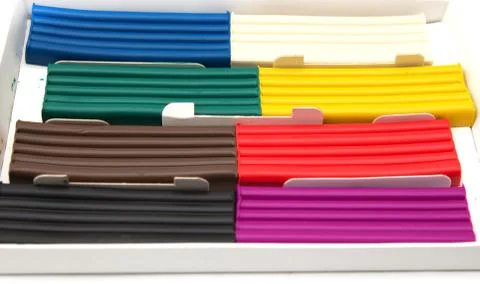 Multicolored plasticine on a white background Stock Photos