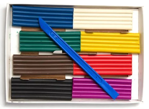 Multicolored plasticine on a white background Stock Photos