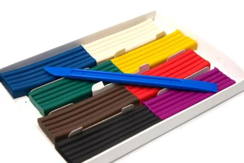 Multicolored plasticine on a white background Stock Photos
