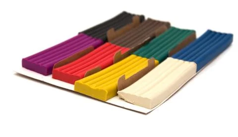 Multicolored plasticine on a white background Foto stock