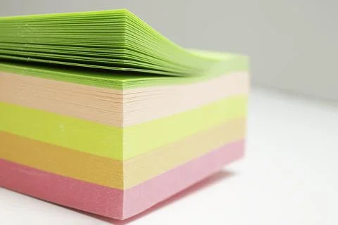 Multicolored post it stickers stack on white background Foto stock