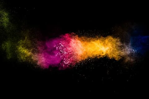 Multicolored powder explosion on black background.Colorful of pastel powder.. Stock Illustration