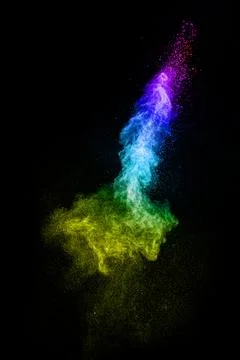 Multicolored powder explosion on black background.Colorful of pastel powder.. Stock Illustration