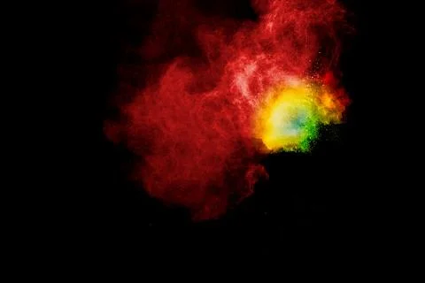 Multicolored powder explosion on black background.Colorful of pastel powder.. Stock Illustration