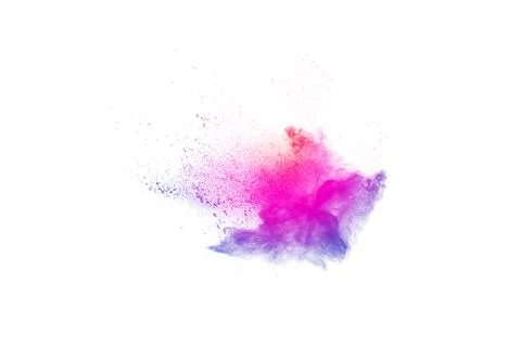 Multicolored powder explosion on white background. Stock Photos