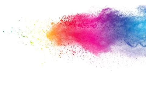 Multicolored powder explosion on white background. Stock Photos