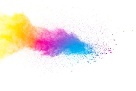 Multicolored powder explosion on white background. Freeze motion paint Holi. Stock Photos