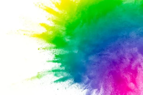 Multicolored powder explosion on white background. Stock Photos