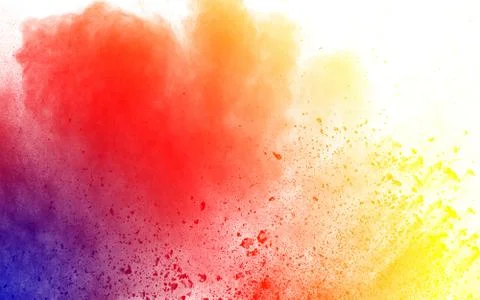 Multicolored powder explosion on white background. Stock Photos