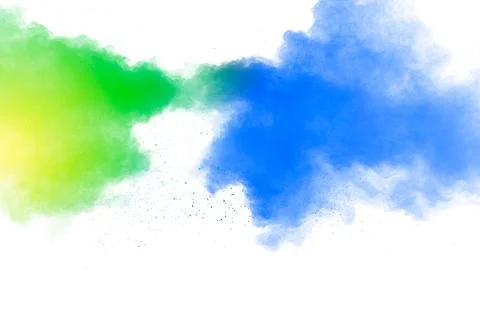 Multicolored powder explosion on white background.Color dust splash cloud o.. Stock Photos