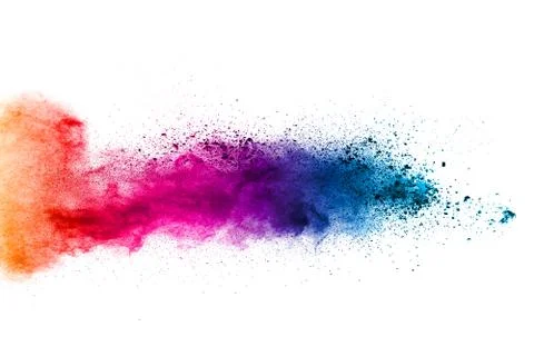 Multicolored powder splatted on white background. Stock Photos