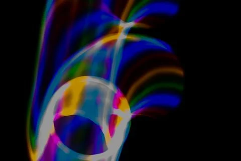 Multicolored rainbow lines on black background Stock Photos