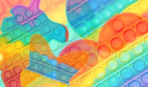 Multicolored rainbow touch toy pop it background Stock Photos