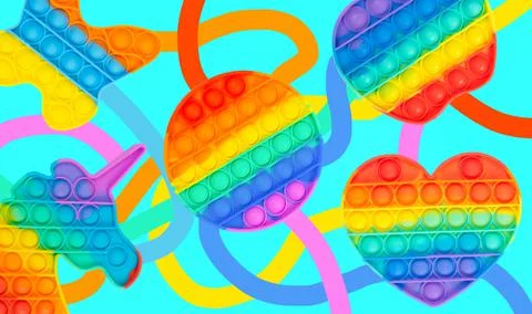 Multicolored rainbow touch toy pop it background Stock Photos