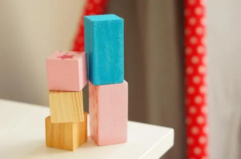 Multicolored rectangular toys for children on top of each other Foto stock