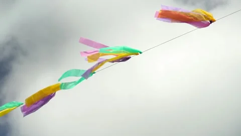 Multicolored Ribbon String Sways On A Windy Day. Slow Motion Stock Footage 247307895