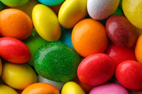 Multicolored round candies Stock Photos