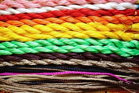 Multicolored sewing threads for embroidery Foto stock