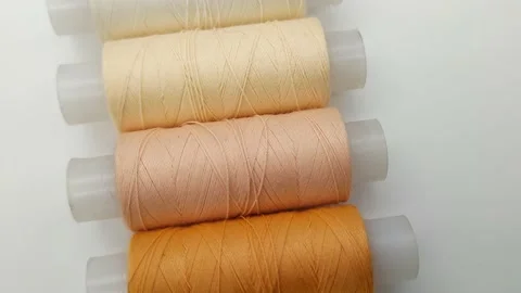 Multicolored sewing threads Видео 166582304