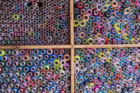 Multicolored Sewing threads pattern texture can be used as a background wal.. Stock Photos