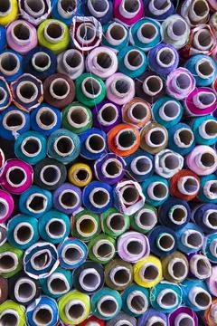 Multicolored Sewing threads pattern texture can be used as a background wal.. Stock Photos