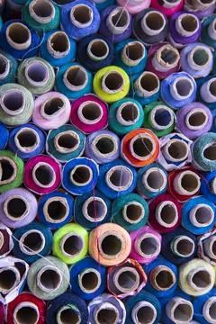 Multicolored Sewing threads pattern texture can be used as a background wal.. Stock Photos