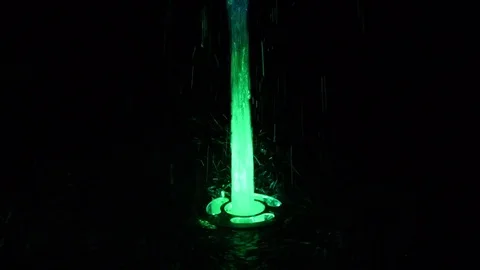 Multicolored single night dancing fountain Stock Footage 74064919