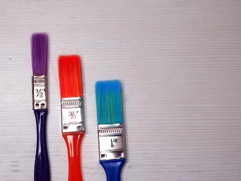 Multicolored small paint brushes Stock Photos