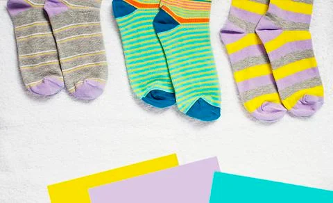 Multicolored socks. Socks of different colors. Stock Photos