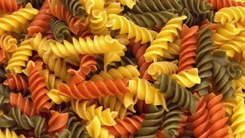 Multicolored spiral pasta or macaroni Stock Footage 151320659
