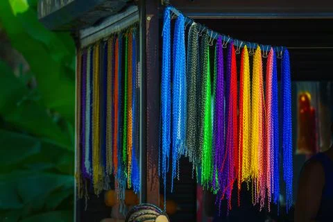 Multicolored spiral threads for afro-braids making Stock Photos