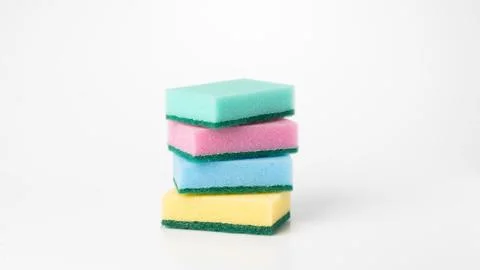 Multicolored sponges in a stack on a white background 스톡 사진