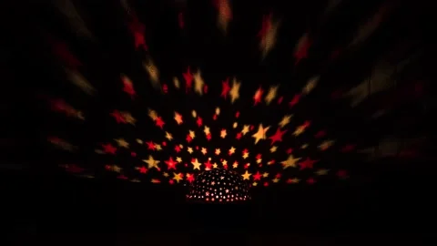 Multicolored stars on the wall from a glowing lantern Stock-Footage 230093154