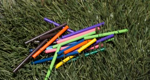 Multicolored sticks lay on Stock Photos