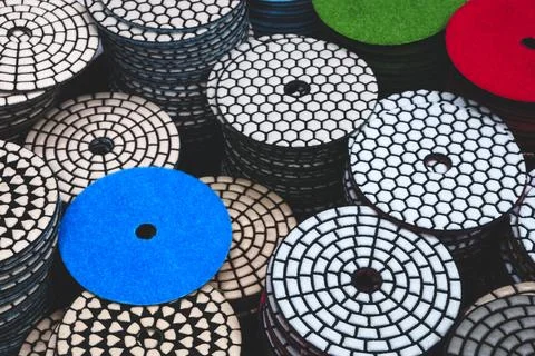 Multicolored stone grinding discs; stone processing industry 스톡 사진