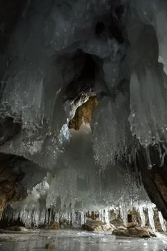 Multicolored stone grotto with icicles 스톡 사진